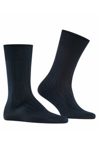 Calcetines acanalados de un azul marino oscuro con puntera y talón reforzados, que cuentan con un cómodo puño elástico para un ajuste seguro.