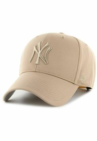 Bež jalgpallikepiga müts, mis on valmistatud kangast ja mille esiosas on tikkitud heledat tooni "NY" logo ning küljes on väike "47" logo.