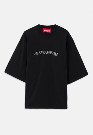 Black oversized short-sleeve T-shirt with curved white "032c" lettering on front and a red brand label inside the collar.