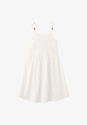 Robe blanche sans manches avec corsage smocké, fines bretelles croisées ornées de perles en bois et jupe froncée.