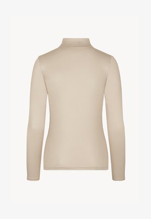 Langsleeve top in lichtbeige, met een staande kraag. Soepele, rekbare stof met een getailleerd ontwerp en zonder zichtbare naden of accenten.