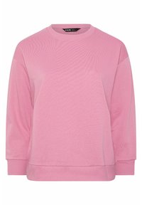 Blød lyserød sweatshirt med rund hals, lange ærmer samt ribstrikkede manchetter og kant, vist på hvid baggrund.