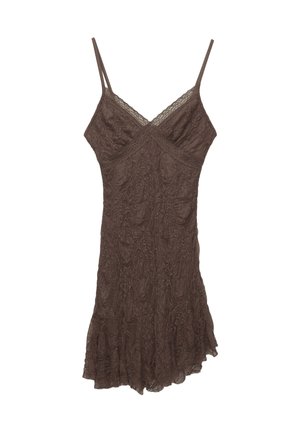 Brun blonde camisole kjole med tynde stropper, V-udskæring, tekstureret stof og bølget kant. Delikate blomster mønstre gennem materialet.