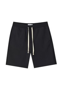 Shorts noirs en matière douce avec une taille élastique, dotés d'un cordon de serrage de couleur crème contrastante et de deux poches latérales.