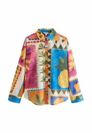 Chemise à manches longues boutonnée avec des motifs colorés de fruits tropicaux et de plantes en orange, bleu, rose, jaune et vert.