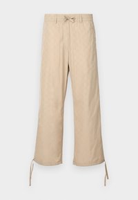 AETHER MONOGRAM PARACHUTE PANTS  - Trousers - humus