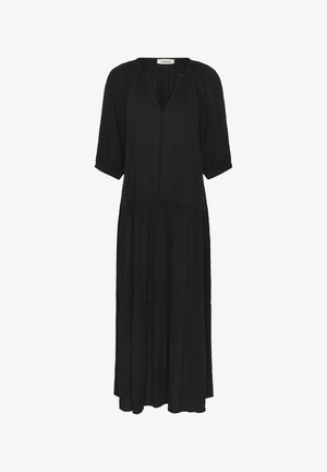 Black, long, tiered dress with V-neckline and elbow-length puff sleeves, made of lightweight fabric.