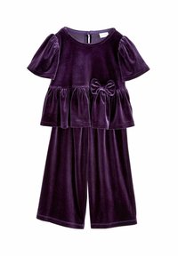Purple velvet two-piece outfit featuring a short-sleeved top with a bow and peplum style, paired with wide-leg pants.