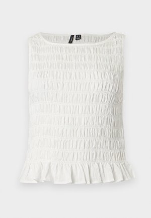White sleeveless top with elastic smocked texture and ruffled hem, featuring a round neckline and fabric tags inside collar.