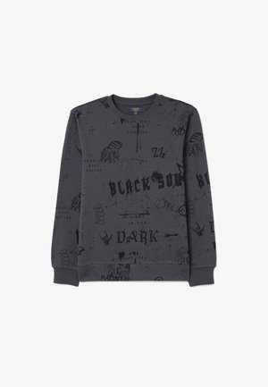 Sudadera de manga larga gris con estampados gráficos negros en negrita, que incluyen texto y diseños, con puños y dobladillo acanalados. Material de jersey suave.