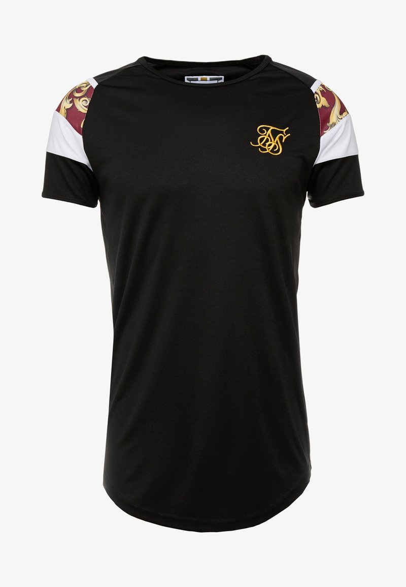 Musta urheilupaita lyhyillä hihoilla; siinä on valkoiset ja burgundinpunaiset kuviot hartioissa sekä kultainen logo rinnassa. Sileä pinta.