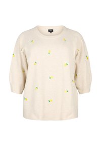 Maglione color crema con maniche corte, decorato con ricami di limoni gialli e foglie verdi. Texture morbida e vestibilità comoda.