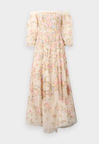 Robe décolletée, de couleur crème, avec broderies florales, manches bouffantes transparentes et une jupe superposée et fluide avec une texture à pois.