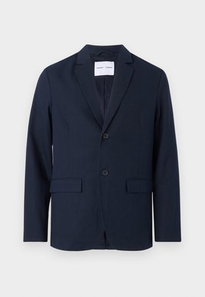 Navy blue blazer made of smooth fabric, featuring a notched lapel, two-button front, and two front pockets for utility.