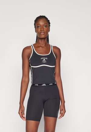 adidas Performance HERITAGE WITH INTEGRATED LOW-SUPPORT - Light support sports bra - black/chalk white