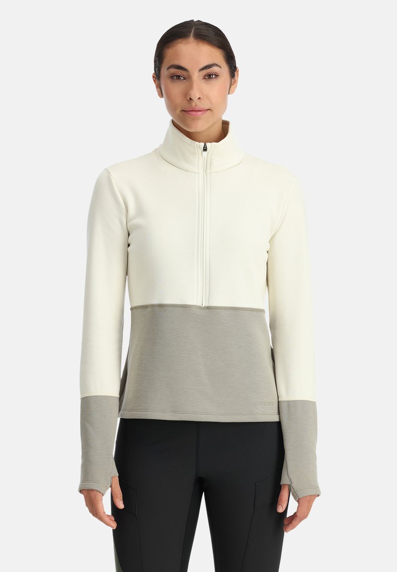 Helle Creme Zip-Up Sweatshirt mit einem grauen Einsatz an der Taille und grauen Akzenten an den Ärmeln. Weicher Stoff, Kragen-Design für zusätzlichen Komfort.