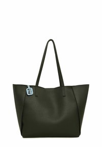 Green textured leather tote bag with two long handles, open top, and a blue tag attached, showcasing a simple, angular design.