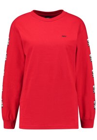 Röd långärmad T-shirt i bomull. Har svart "OBEY"-logotyp på bröstet och grafiska mönster på båda ärmarna. Rund halsringning, normal passform.