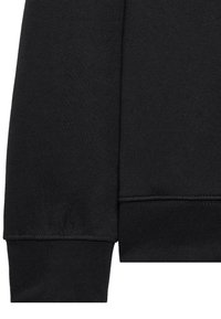 Manga de sudadera negra con puño de canalé. Textura de mezcla de algodón suave, con un diseño limpio y sin patrones visibles.