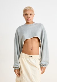 Nike Sportswear DANCE SHRUG - Sweatshirt - dark grey heather/sail