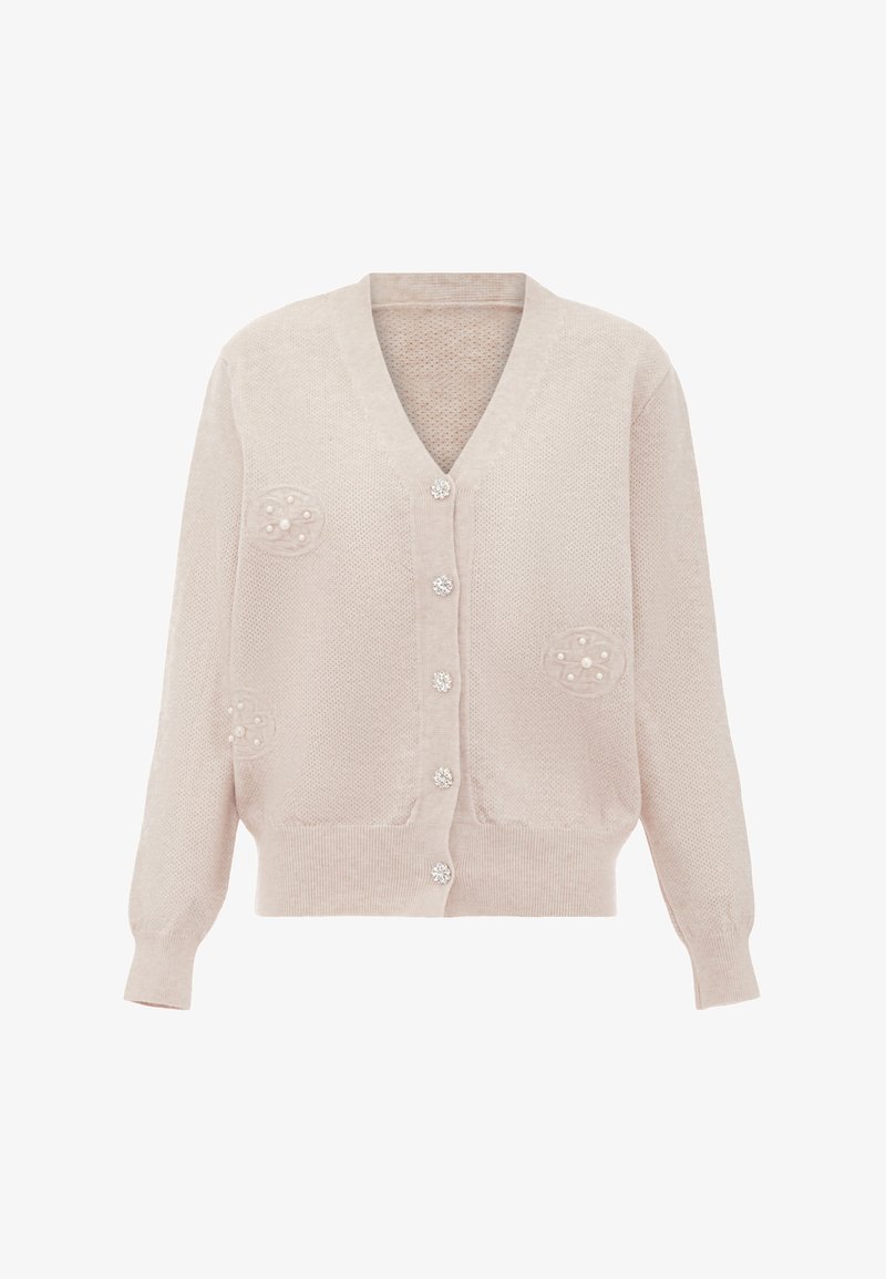Beige stickad kofta med V-hals, långa ärmar och strukturerad tyg. Har pärlliknande detaljer på fickor och fem smyckade knappar.