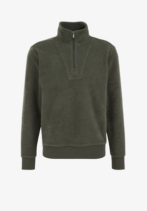 Sötétzöld fleece pulóver magas gallérral, fényzippzárral, bordázott mandzsettákkal és aljjal. Texturált első panel dizájn jellemzi.