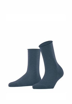 Chaussettes en coton bleu marine avec une texture lisse, des bords côtelés et un design classique de hauteur au niveau de la cheville. Forme standard pour le confort et l'ajustement.