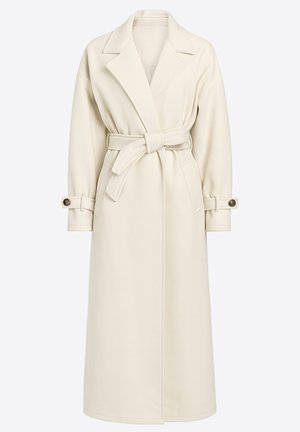 Ecru trenchcoat i struktureret stof med dobbeltspændt design, bælte i taljen og manchetter med knapdetaljer. Midilængde silhuet.