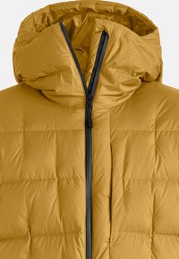 Yellow puffer jacket with a hood, featuring a grid pattern, quilted design, and a black zipper down the center. Soft, puffy texture.