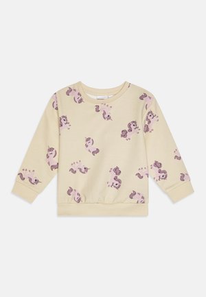 Gara piedurkne dzeltena sporta krekls no mīksta auduma, ar rotaļīgu vienradža rakstu rozā un purpura krāsā. Ribotās aproces un apakšmala.