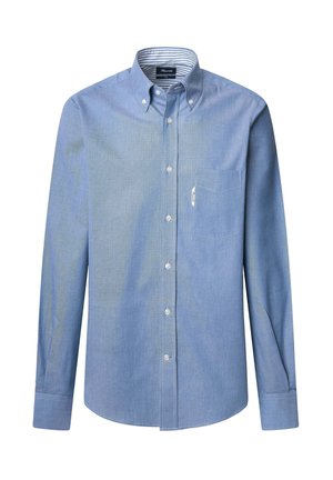 Camisa de botones de color azul claro con mangas largas, un bolsillo en el pecho y un cuello interior a rayas. Fabricada con tela tejida de textura suave.