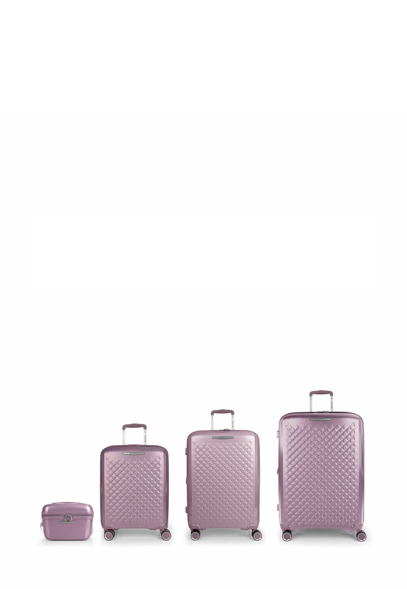 Set aus vier lilanen Hartschalenkoffern mit gesteppter Musterung, glatten Oberflächen und multidirektionalen Rollen.