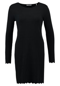 Black long-sleeve dress with a scoop neckline and scalloped hem. Made of textured fabric with a fitted silhouette. No visible patterns or accents.