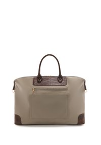 Beige tas gemaakt van soepel materiaal met bruine krokodilstructuur accenten. Voorzien van dubbele handvatten en een voorste ritstas.