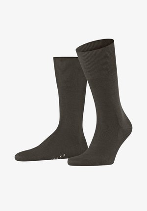 Dunkelgraue Baumwollsocken mit einem gerippten Bündchen, nahtlosem Zehenbereich und verstärkter Ferse. Sie bieten eine glatte Textur und einen leichten Glanz.