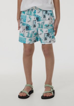 Costumi da bagno con un motivo azzurro chiaro e bianco che presenta palme, tavole da surf e scene di spiaggia. Vita elastica con cordini.