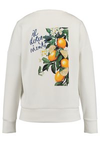 Felpa bianca con un vivace grafico di arance e fiori sul retro, con il testo "il dolce far niente" in blu.