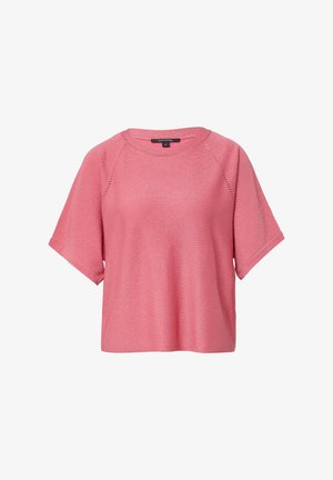 Short-sleeve, loose-fitting top in pink knit fabric with a textured finish and raglan sleeves. Features a round neckline and subtle perforations.