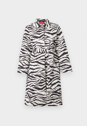 Long quilted coat with black and white zebra stripes, belted waist, and collar, displayed on a plain background.