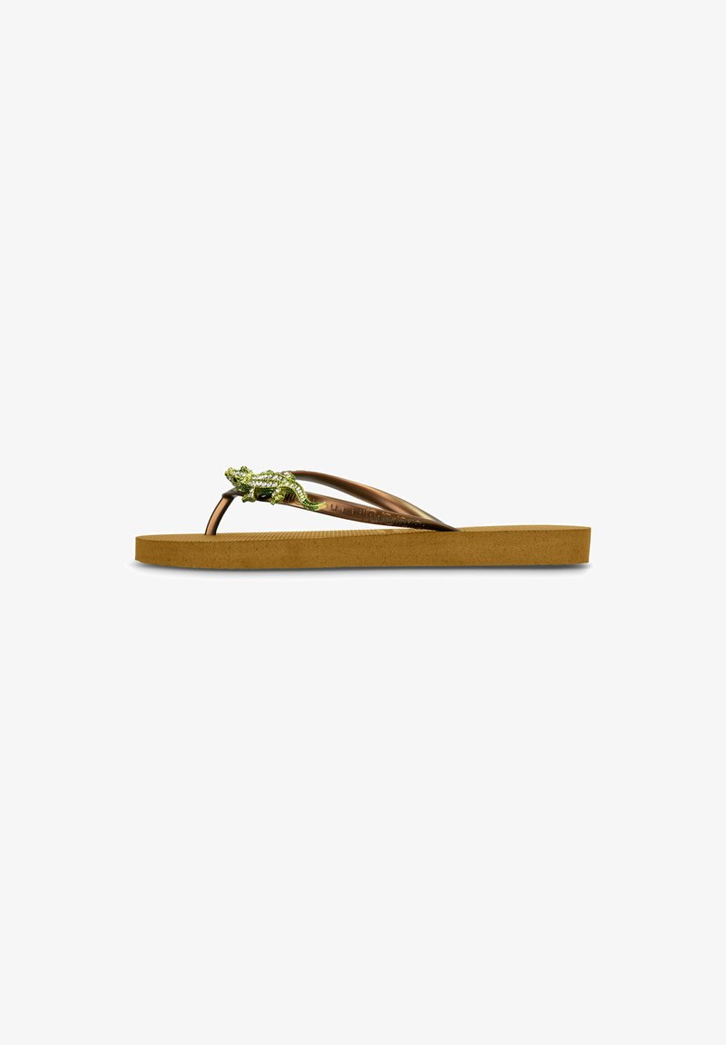 Flip-flop sandal with brown rubber straps, green frog accent, textured footbed, and beige sole. Lightweight design for casual wear.