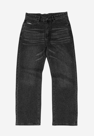 Musta pesty suora lahje farkut, joissa on etu- ja takataskut sekä hienovaraiset vaakaruudut reisien yläosassa.