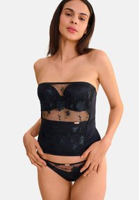 Zwarte strapless bodysuit met doorzichtige bloemembroidery en bijpassende bikini. Heeft een aansluitend ontwerp en een gladde textuur, verfraaid met hardware.