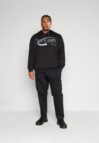 Jack & Jones JPSTBILL JJCLEAN TAPERED - Pantalon cargo - black