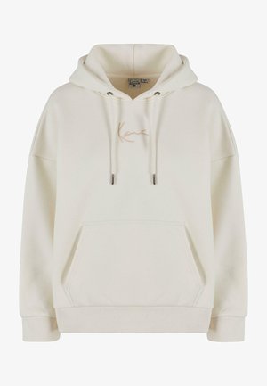 Gräddfärgad hoodie med dragsko och ficka fram. Har en broderad logotyp i beige. Tillverkad av mjuk, texturerad tyg.