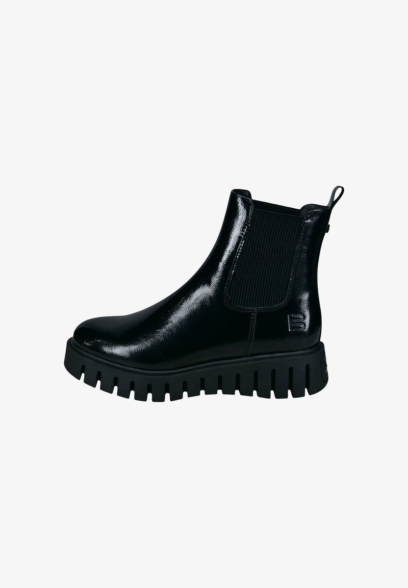 Botte Chelsea noire brillante avec semelle épaisse à reliefs, panneau latéral élastique et languette à l’arrière, affichée en profil droit.