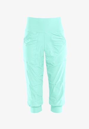 Mint green capri pants made of lightweight fabric, featuring a wide waistband, side pockets, and gathered detailing on the hips.