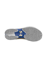 Sula med blå och guld design, texturerad grå gummisula med zigzag- och herringbone-mönster samt centralt logodetalj.