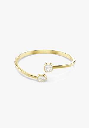 Bracelet en or avec des gemmes claires : une en forme de poire et l'autre hexagonale, montées à chaque extrémité d'un bandeau lisse.