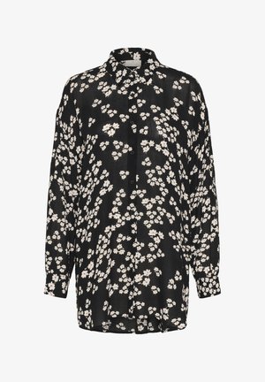 Must mustriga nööbitav särk, millel on lilleline muster valgete lillede ja punaste aktsentidega. Särgil on kaelus ja pikad varrukad.