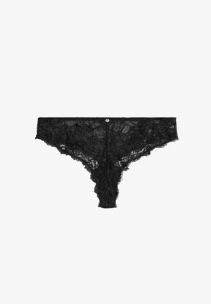 Tanga de encaje negro con patrón floral y bordes festoneados. Presenta un pequeño botón decorativo plateado en la parte central trasera. Ligero y transparente.